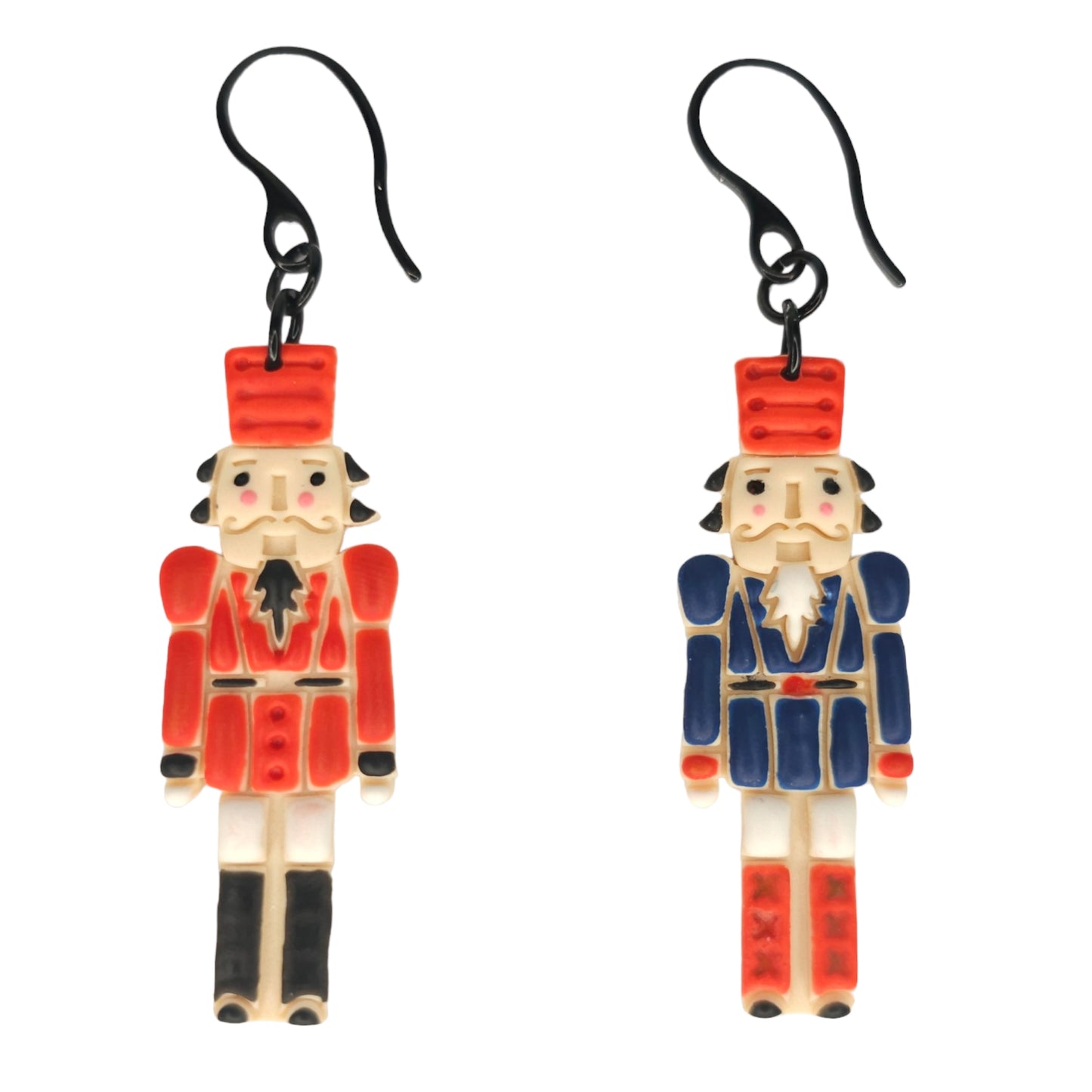 Χριστουγεννιάτικα κρεμαστά ανόμοια σκουλαρίκια καρυοθραύστες από πολυμερικό πηλό