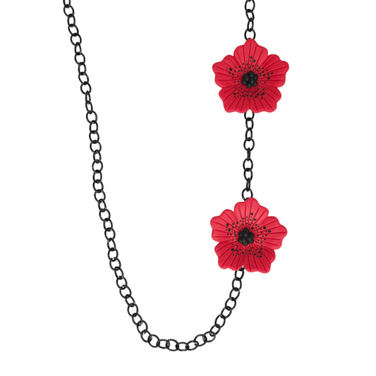 Μακρύ κολιέ με δύο κόκκινα γλυπτά λουλούδια και μαύρη ατσάλινη αλυσίδα